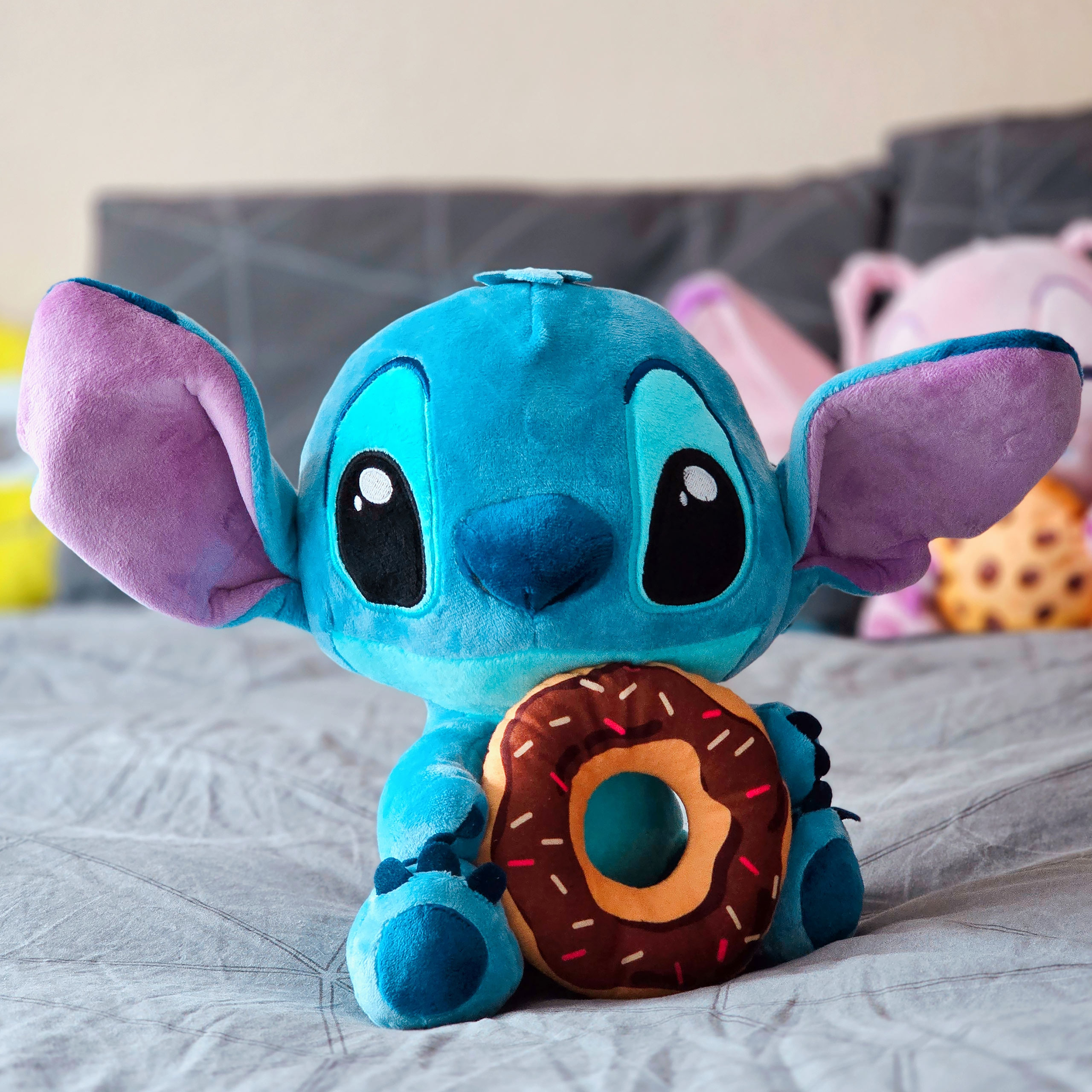 Lilo & Stitch pluszowa figurka Stitch z donutem 25 cm
