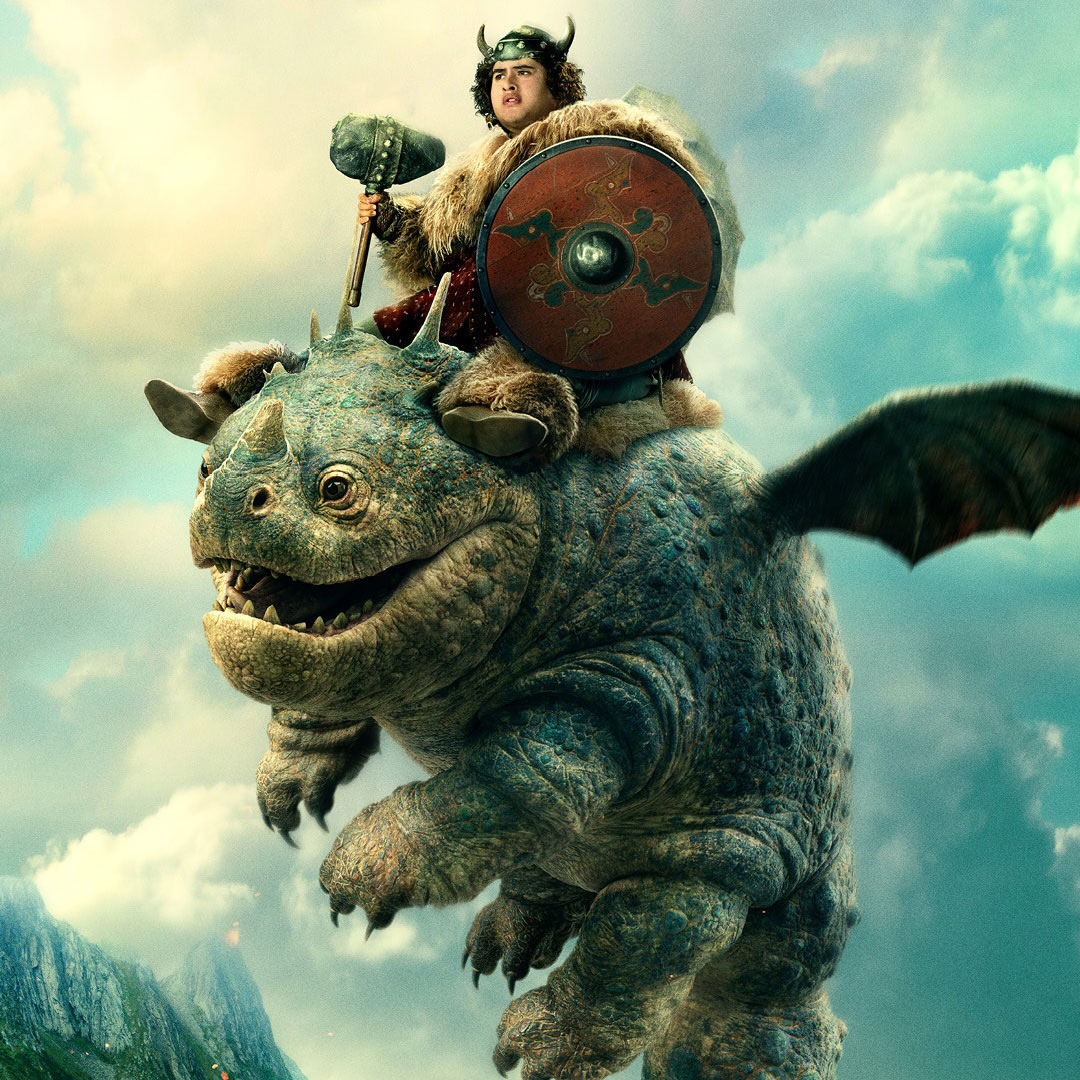 A sturdy boy in Viking attire with helmet, shield, and hammer rides a round, horned dragon through a cloudy sky scene.