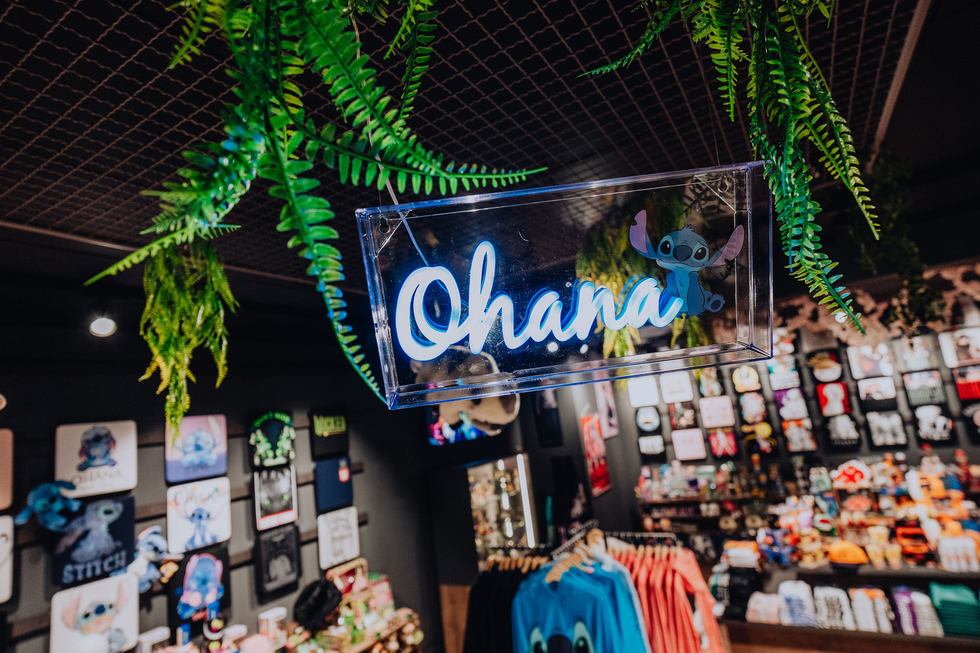 A Lilo & Stitch lamp with glowing neon text that reads “Ohana”.